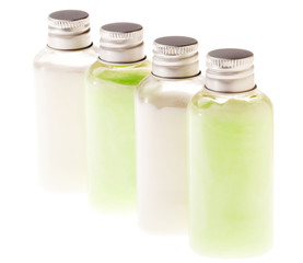Isolated Green & White Lotion Bottles