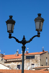 Fototapeta na wymiar Old lantern w Calvi, Korsyka