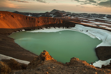 Midnight sunset over Viti crater in Krafla volcanic area