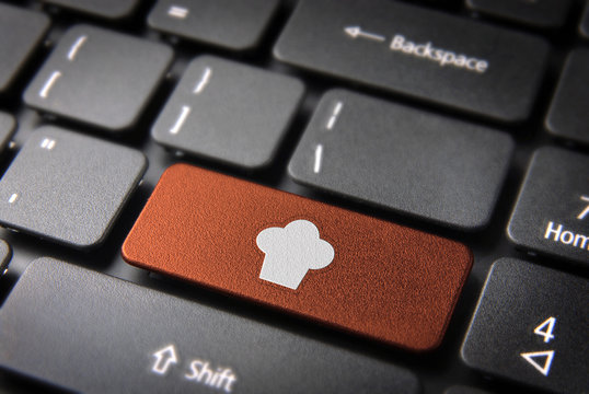 Orange Chef hat keyboard key, Food background