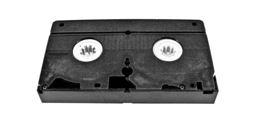 Old video cassette standard isolated on white background