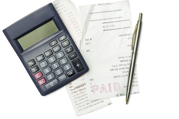 Shopping bills ,pen and calculator