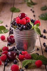 Assorted berries in pail