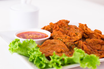 Frying curried fish thai food on the dish
