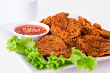 Frying curried fish thai food on the dish