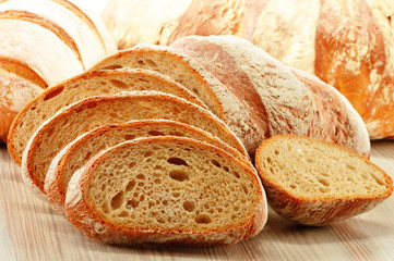 Composition with loafs of bread isolated on white
