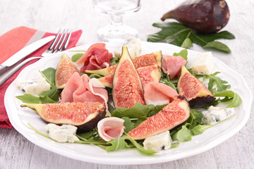 fresh appetizer with fig and ham