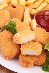 chicken nuggets,french fries and salad