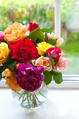 large vase with colorful roses