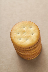 Sandwich biscuits in a brown paper background