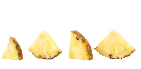 Quarters of slices pineapple.