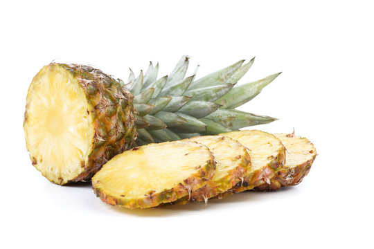 pineapple with slices on a white background