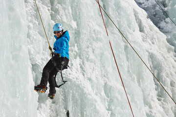 Female Ice Climber in South Tyrol, Italy