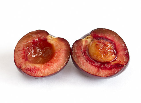 Two halves of a picota cherry