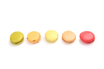 Colorful macaroon in close up isolated on white background