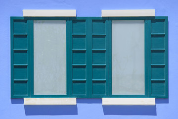 Fototapeta premium vintage windows on the blue wall