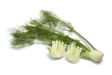 Whole and half fennel bulb