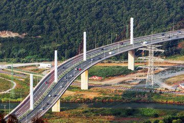 highway on bridge whit cars and columns