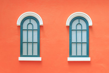 vintage windows on the orange wall