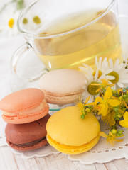 Obraz na płótnie Canvas macaroons and chamomile tea