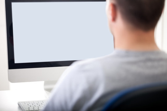 young man  using computer