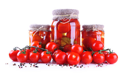Tasty canned and fresh tomatoes, isolated on white