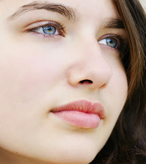 Fototapeta premium Beautiful young woman looking away