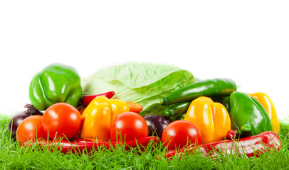 vegetable on green gras on isolated white  background