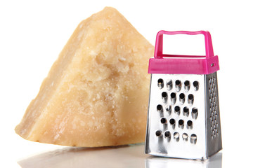 Piece of Parmesan cheese with grater isolated on white
