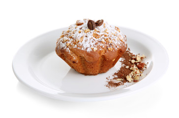 Tasty muffin cake with powdered sugar and cocoa