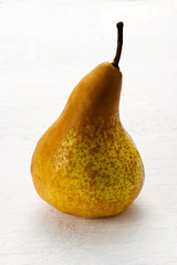 Single fresh ripe yellow pear