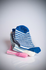 Three different sock pairs, stacked