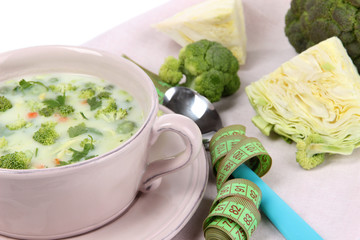 Cabbage soup in plate on napkin close-up