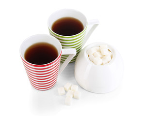 Tea cup and sugar-bowl on white background