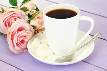 Cup of coffee, on color wooden background