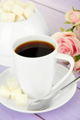 Cup of coffee, on color wooden background