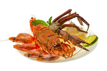 Spiny lobster, shrimps, crab legs  and rice