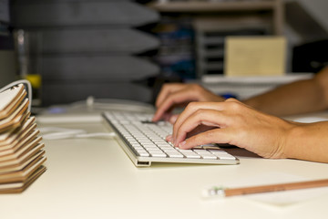 Fototapeta na wymiar woman writing on keyboard