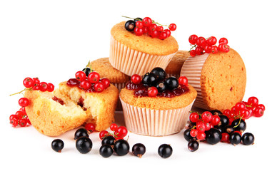 Tasty muffins with berries isolated on white
