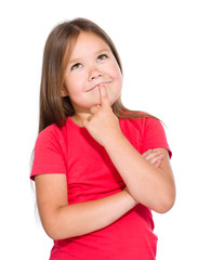 Little girl is thinking about something