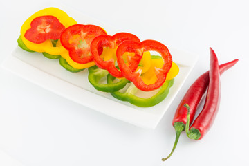 Chili pepper and paprika isolated on white background