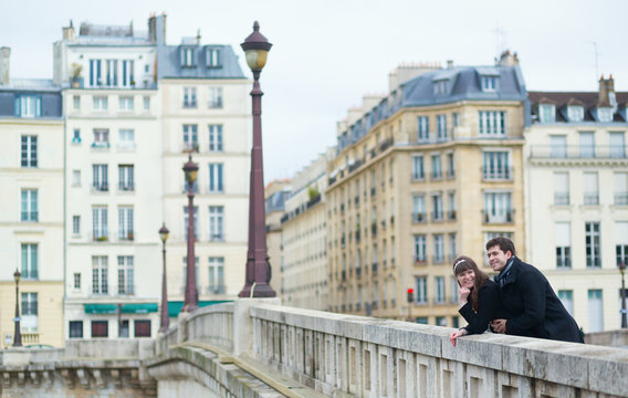 Couple on a Parisian bridge