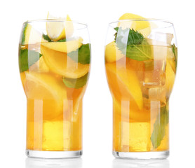Iced tea with lemon and mint isolated on white