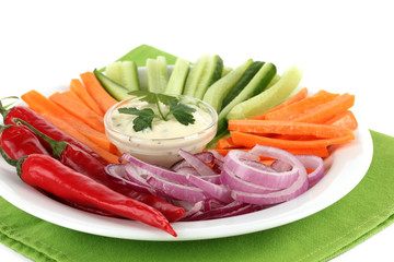 Assorted raw vegetables sticks in plate isolated on white