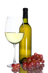 White wine glass and bottle of wine isolated on white