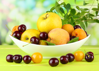 Bright summer fruits in plate