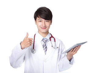 Doctor with stethoscope showing thumb up