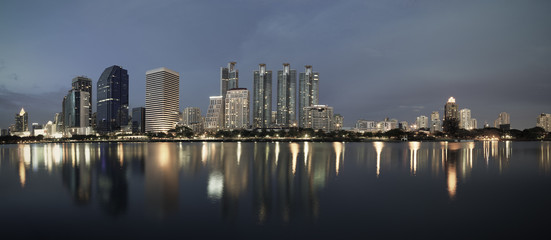 Fototapeta premium business buildings area and office, cityscape at twilight panora