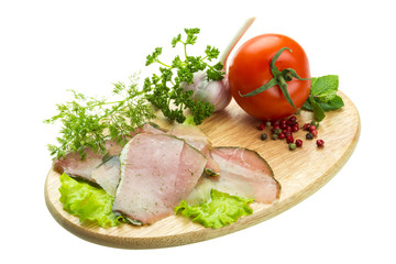 Ripe fresh ham with vegetables