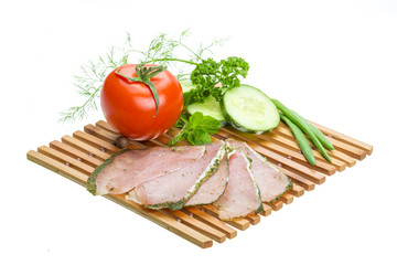 Ripe fresh ham with vegetables